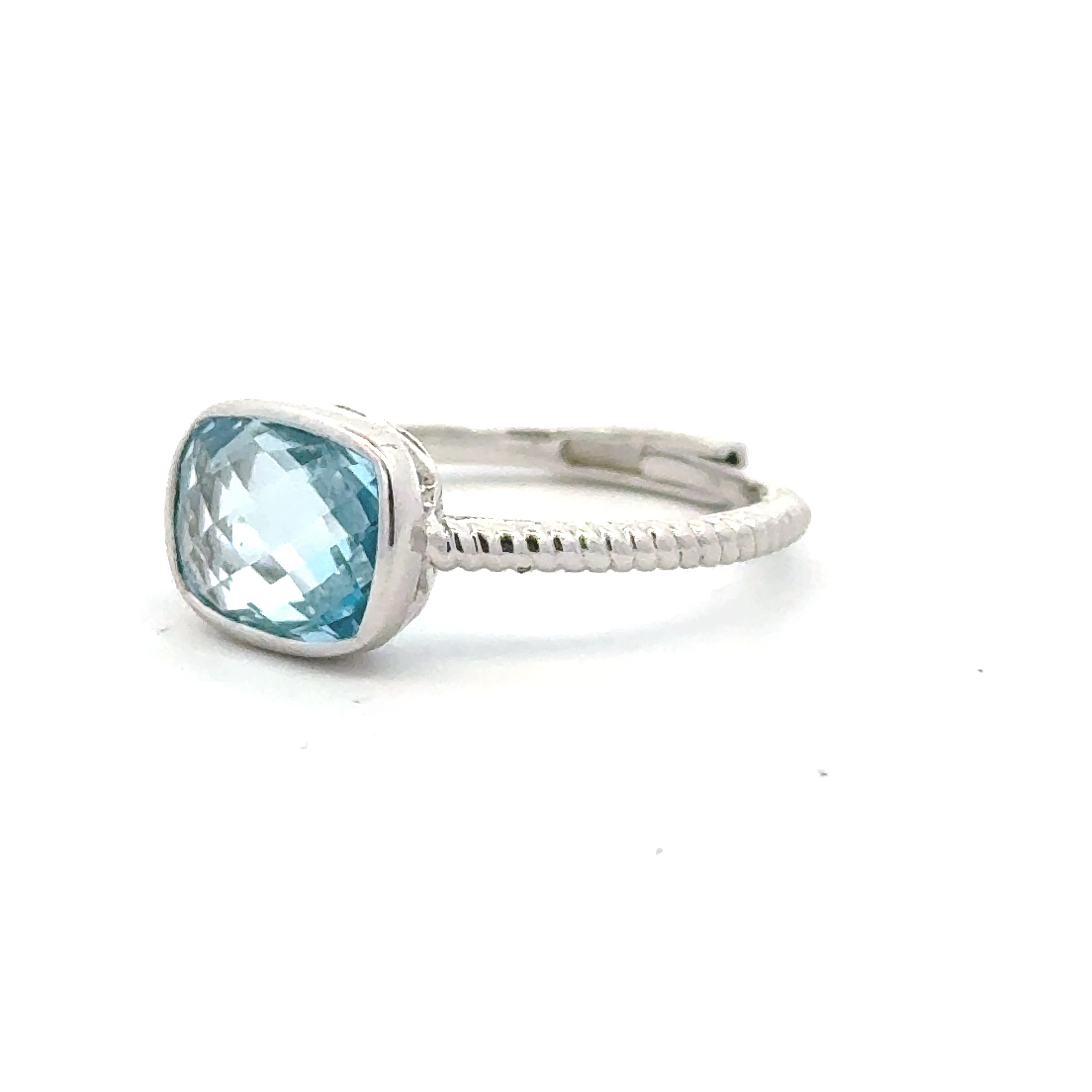 Color Candy Rings  with 2.05  Cushion Blue Topaz 0.00  Sides set on 1.49gr Silver