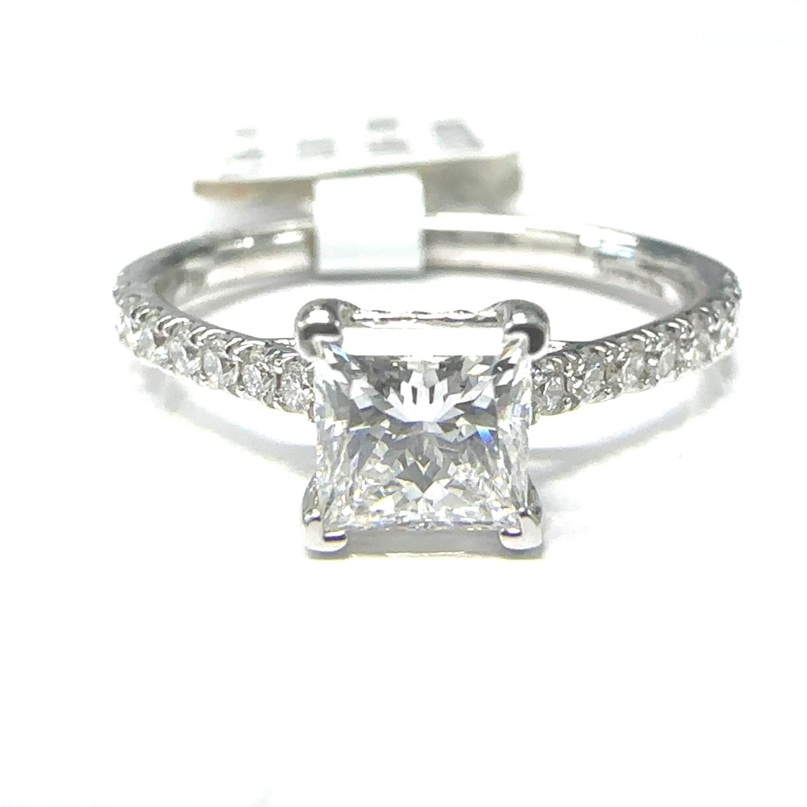 Fireworks Jewelry Rings  1.00   with 0.76  Princess Cut Diamond 0.24  Sides set on 2.48gr 18k WG