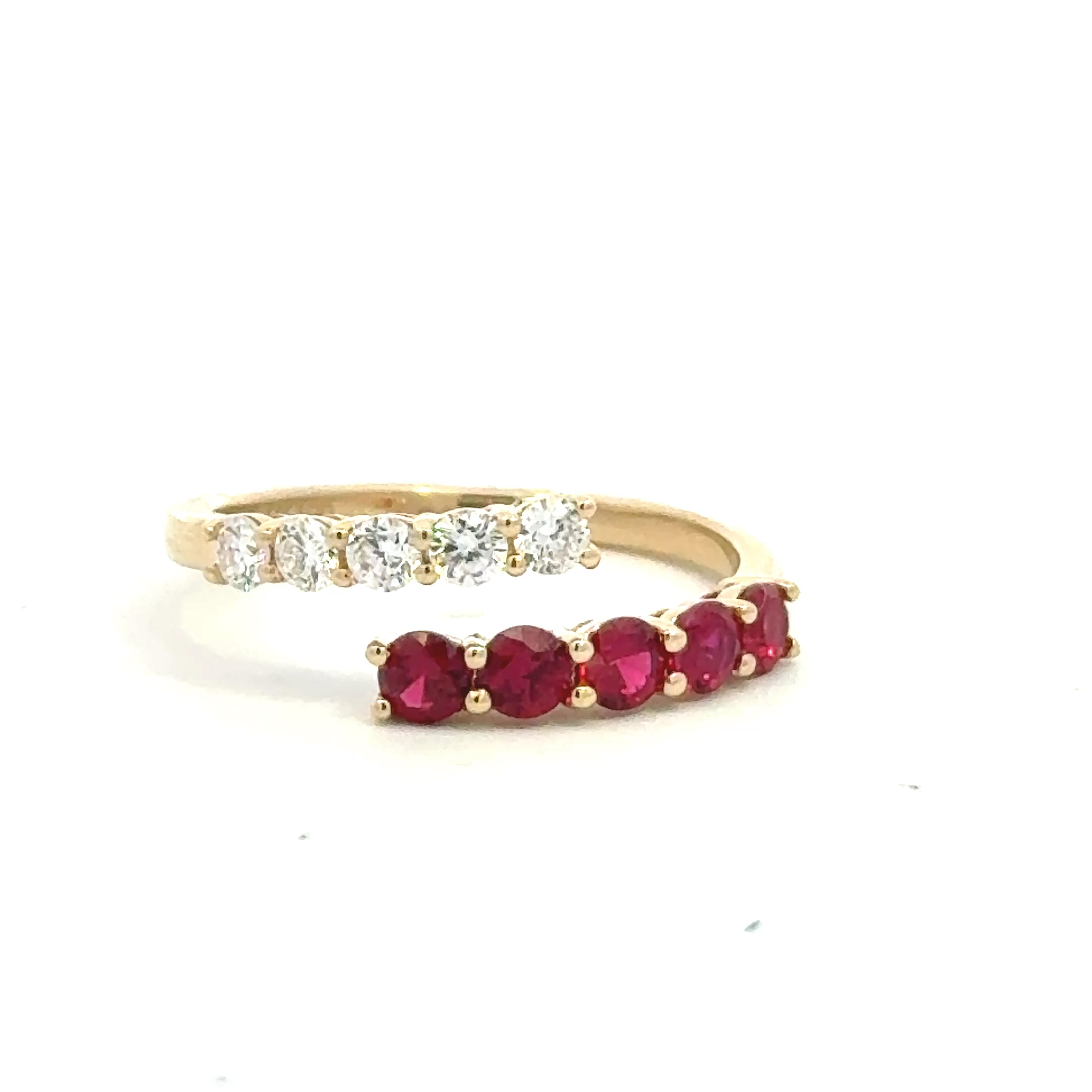 Gemma Rings  0.29   with 0.68 Ruby 0.29  Sides set on 2.10gr 14k YG