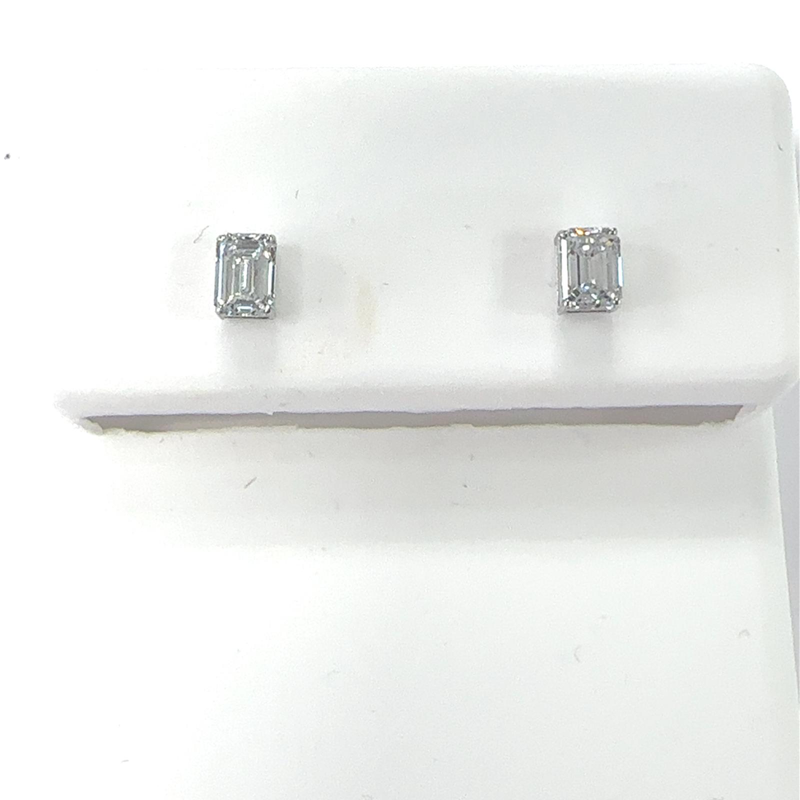 LUCY Collection Earrings with 2 pcs 0.7 ctw set on 0.62 gr 14k WG 0.76 GW