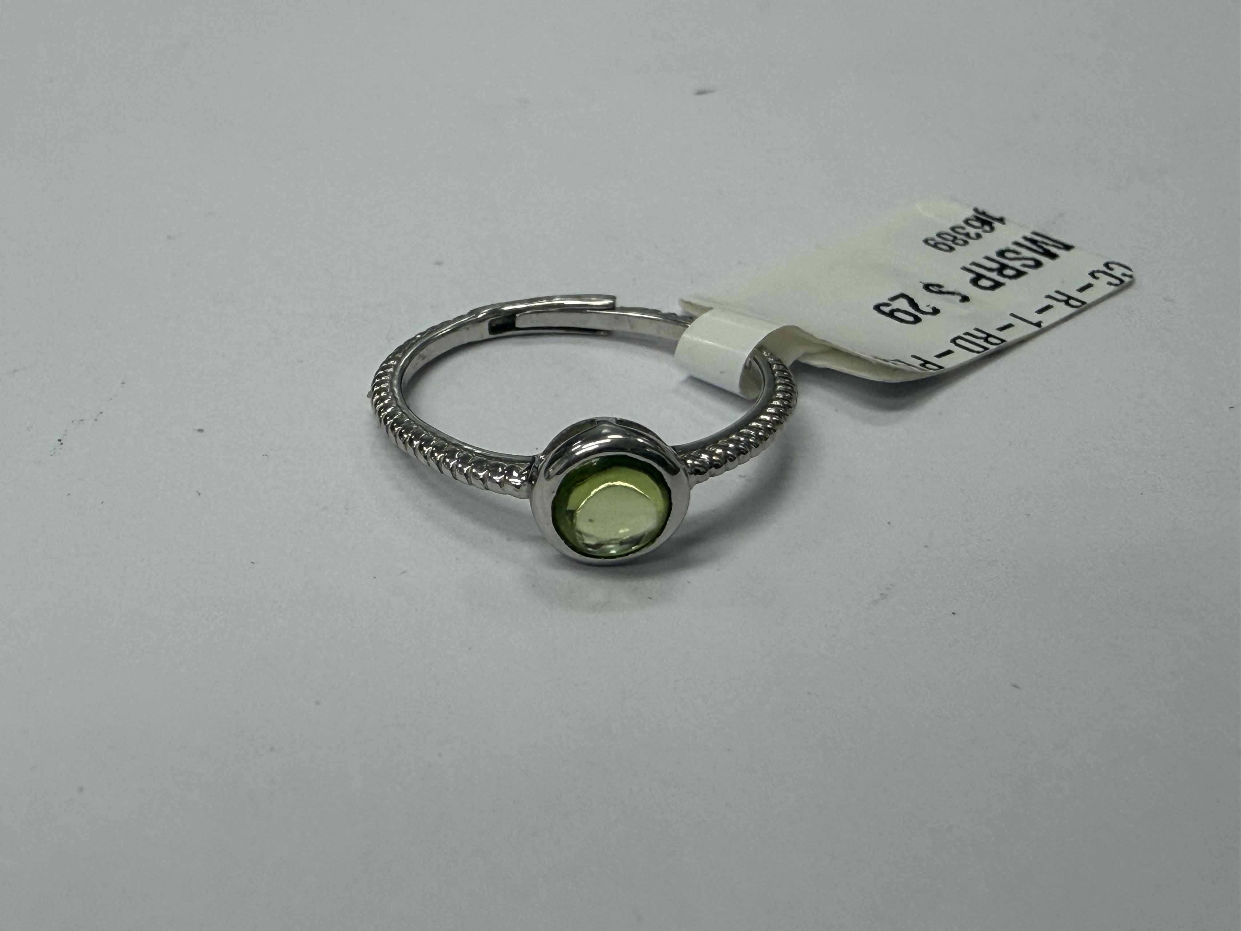 Color Candy Collection Rings with 1 pcs 5MM RD Peridot set on 1.45 gr SS/14k WG 