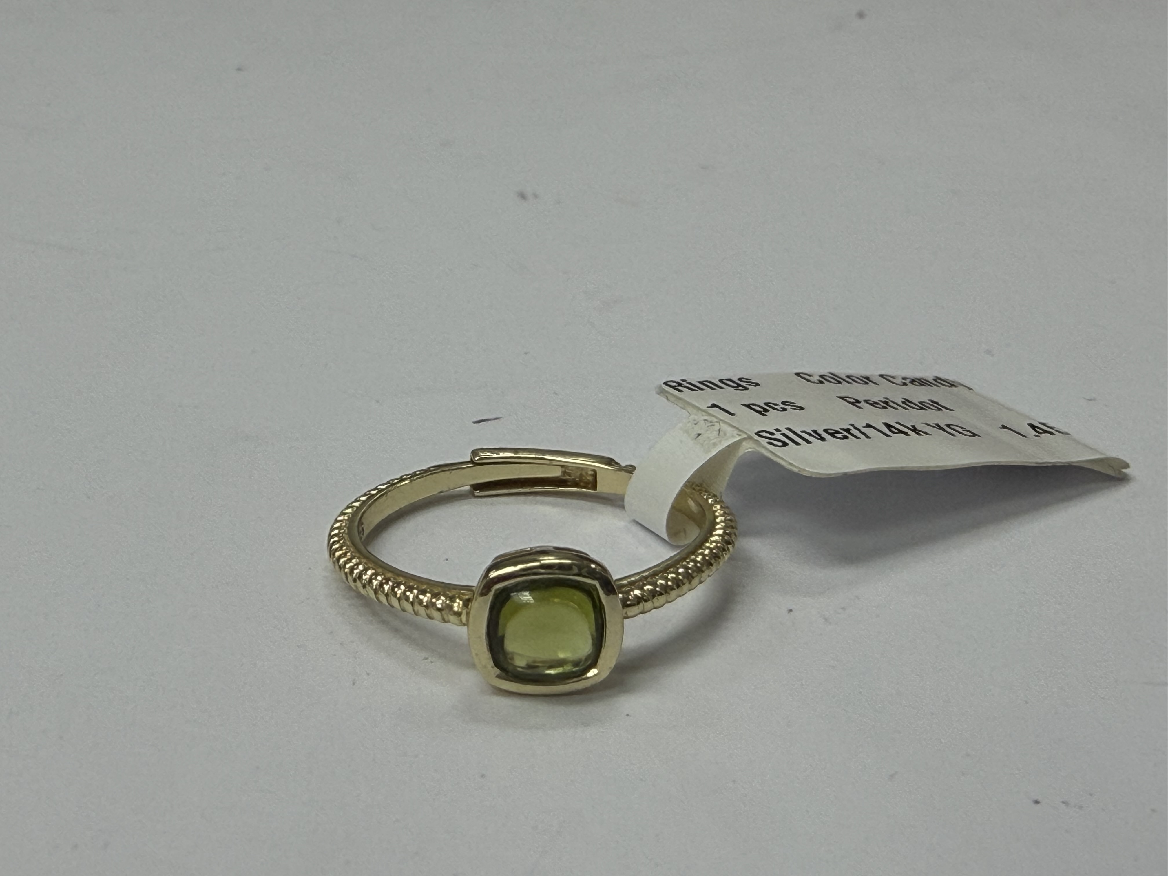 Color Candy Collection Rings with 1 pcs 5MM CU Peridot set on 1.45 gr SS/14k YG 