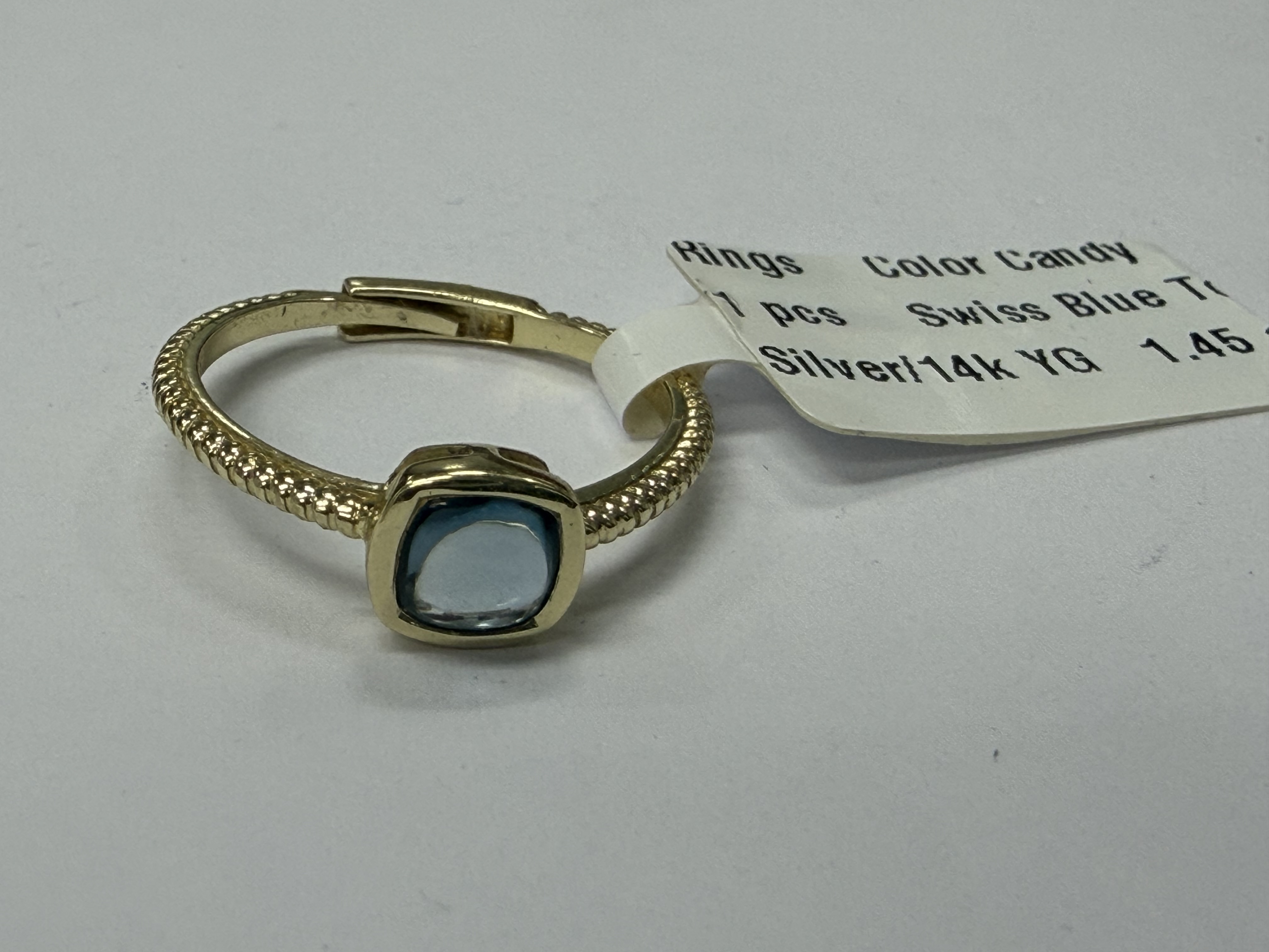 Color Candy Collection Rings with 1 pcs 5MM CU Swiss Blue Topaz set on 1.45 gr SS/14k YG 