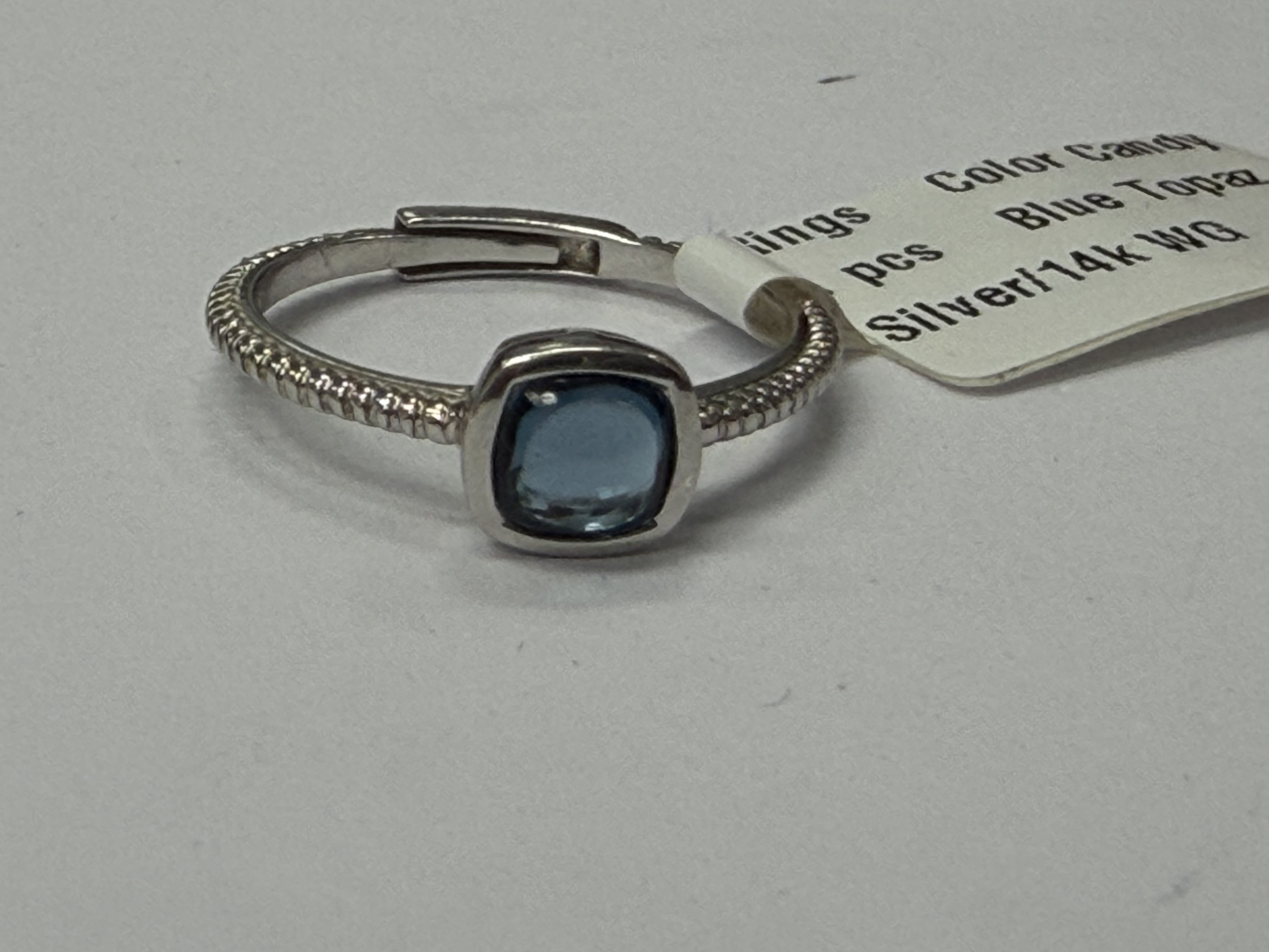 Color Candy Collection Rings with 1 pcs 5MM CU Blue Topaz set on 1.45 gr SS/14k WG 