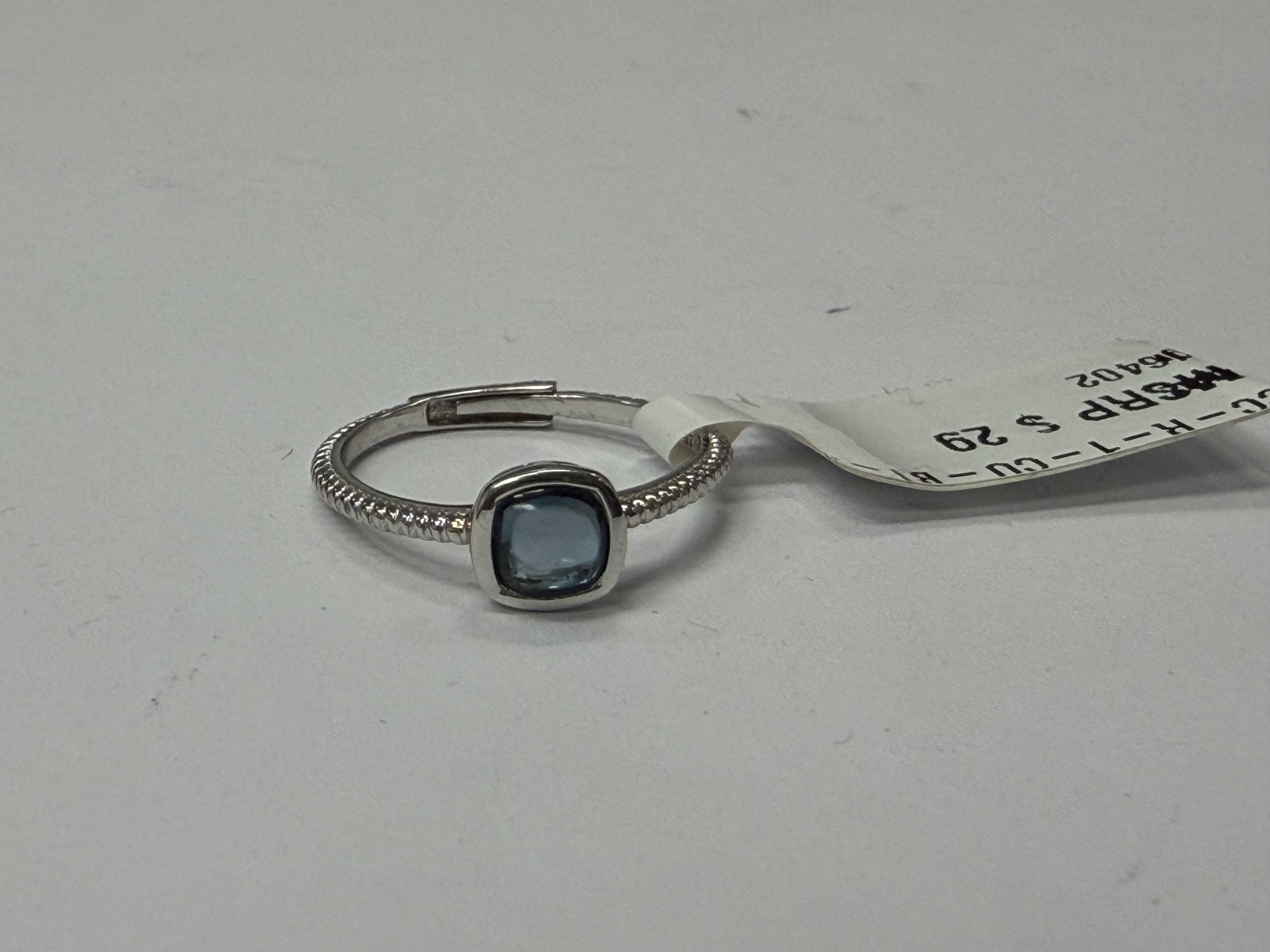 Color Candy Collection Rings with 1 pcs 5MM CU Swiss Blue Topaz set on 1.45 gr SS/14k WG 