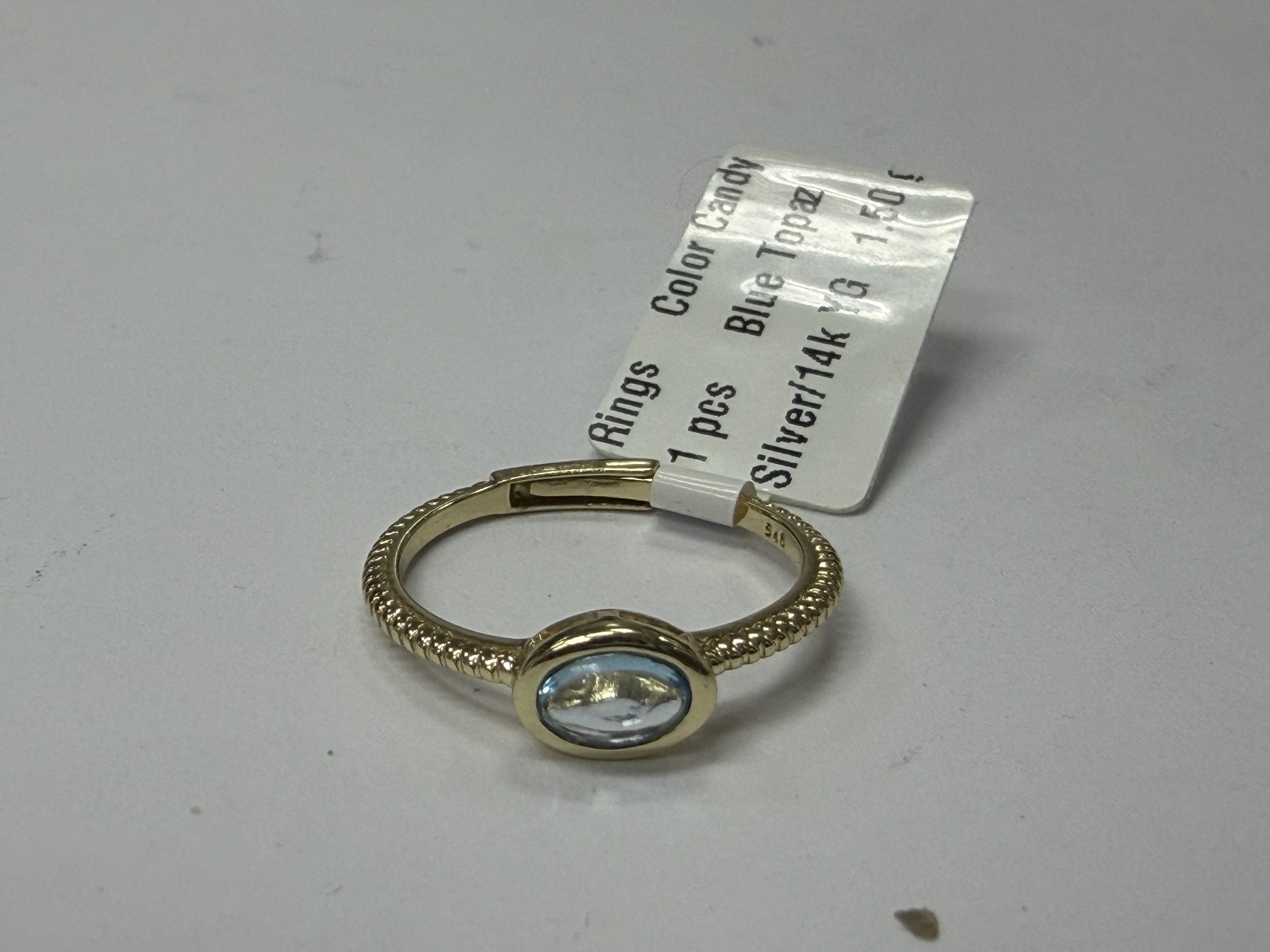 Color Candy Collection Rings with 1 pcs 6X4 OV Blue Topaz set on 1.5 gr SS/14k YG 