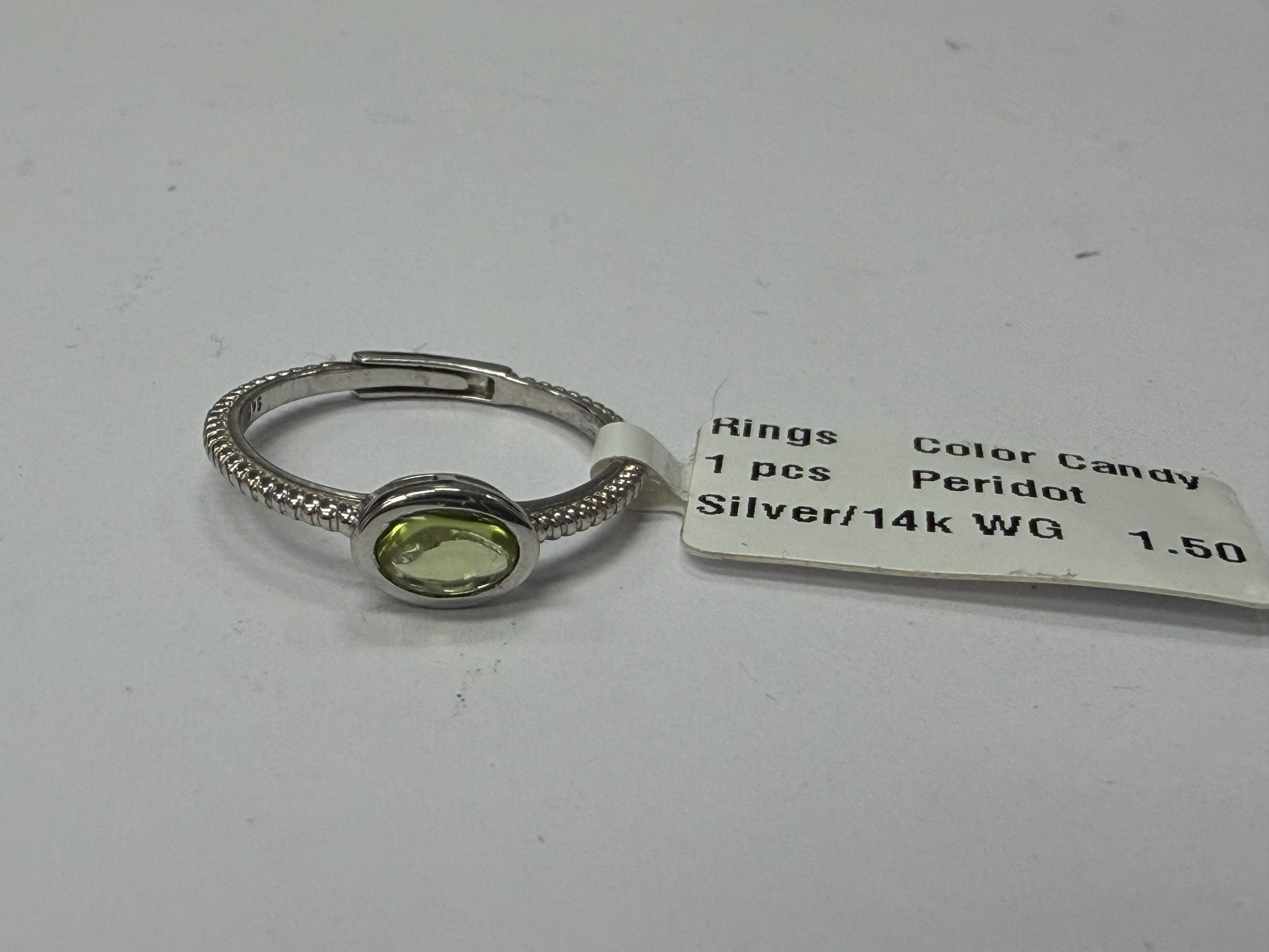 Color Candy Collection Rings with 1 pcs 6X4 OV Peridot set on 1.5 gr SS/14k WG 