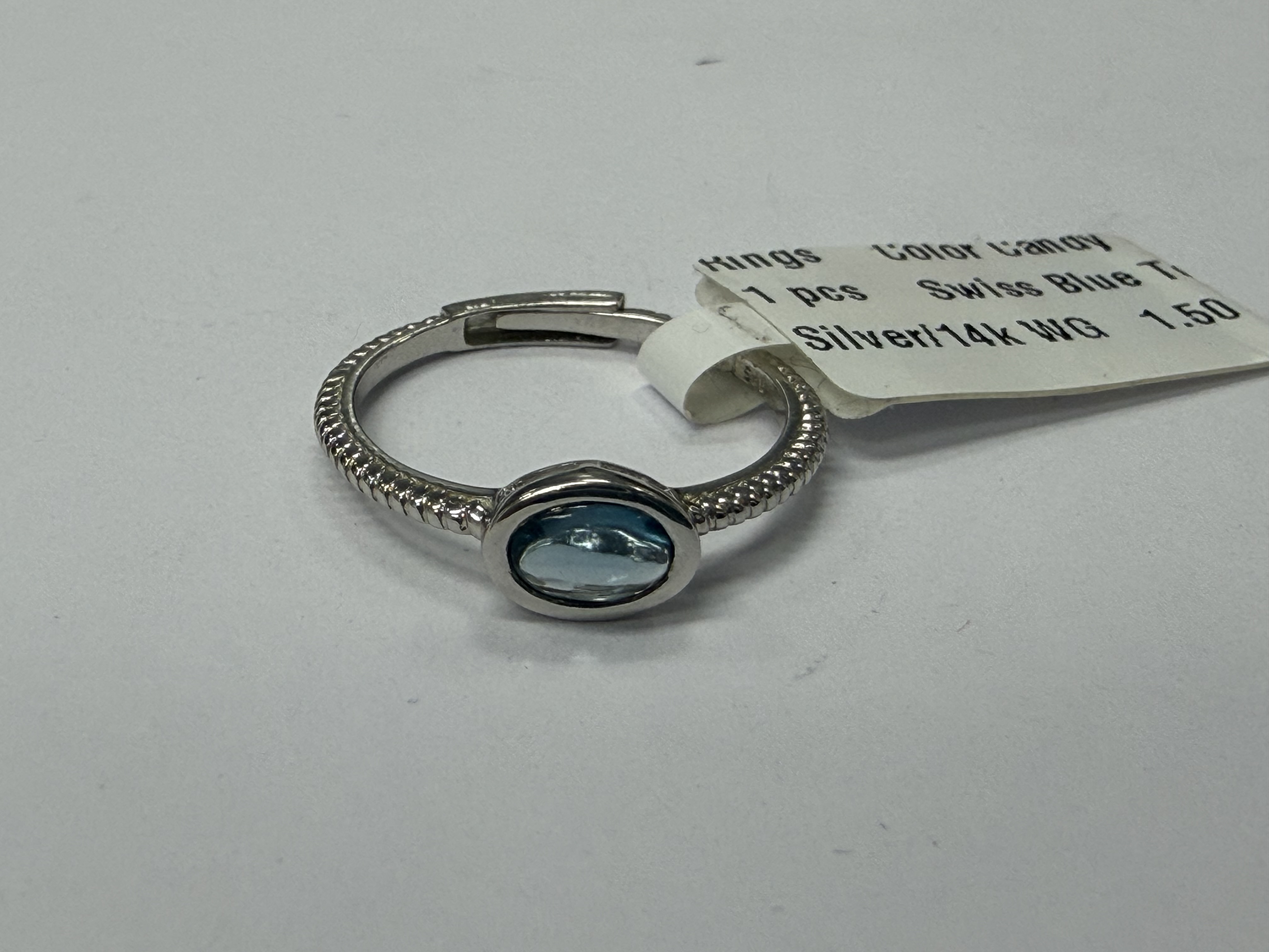 Color Candy Collection Rings with 1 pcs 6X4 OV Swiss Blue Topaz set on 1.5 gr SS/14k WG 