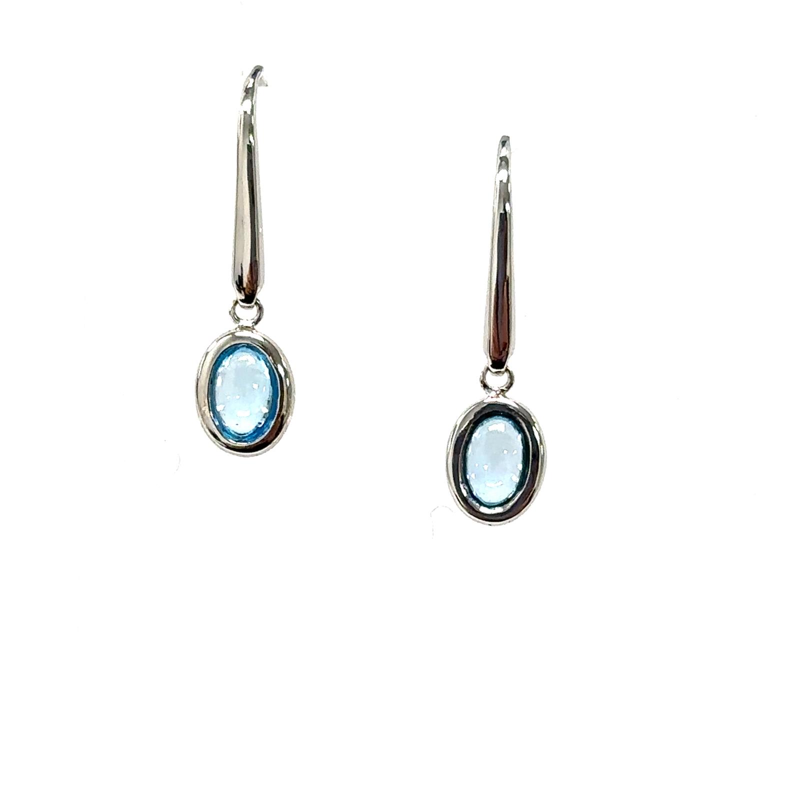 Color Candy Collection Earrings with 2 pcs 6X4 OV Swiss Blue Topaz set on 1.55 gr SS/14k WG 