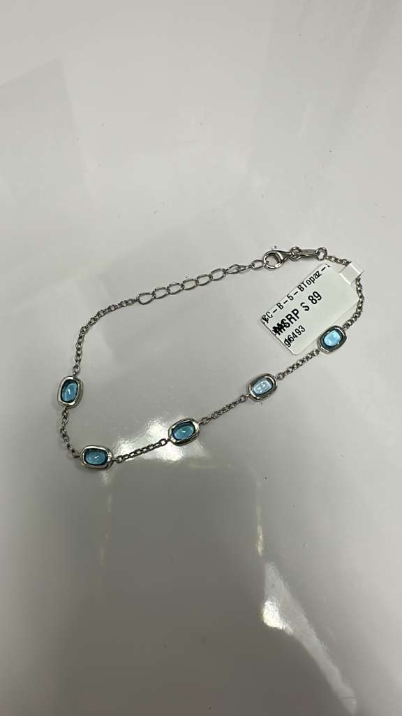 Color Candy Collection Bracelet with 5 pcs 6X4 CU Swiss Blue Topaz set on 2.55 gr SS/14k WG 
