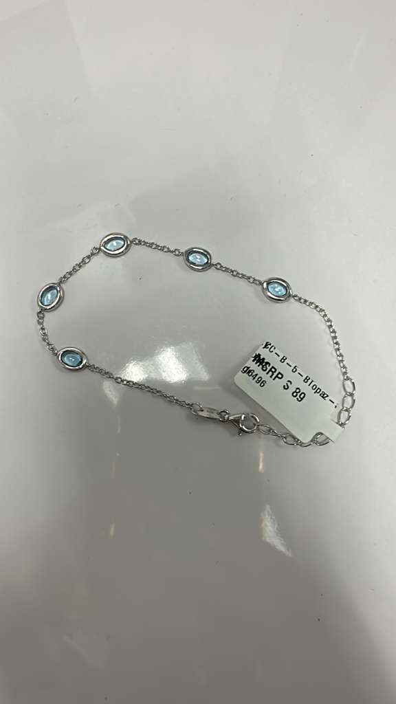 Color Candy Collection Bracelet with 5 pcs 6X4 OV Swiss Blue Topaz set on 2.76 gr SS/14k WG 