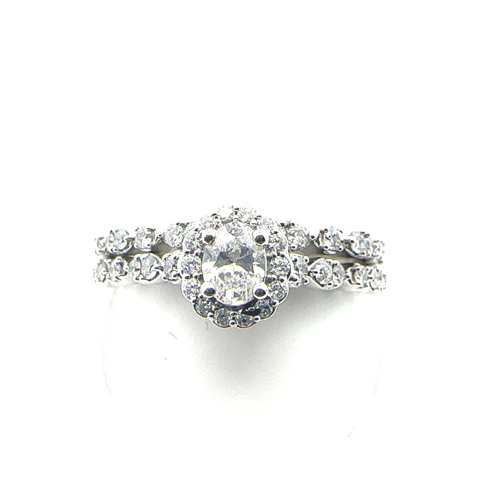 Close Outs Rings  0.64  Diamond Sides set on 4.20gr 14k WG